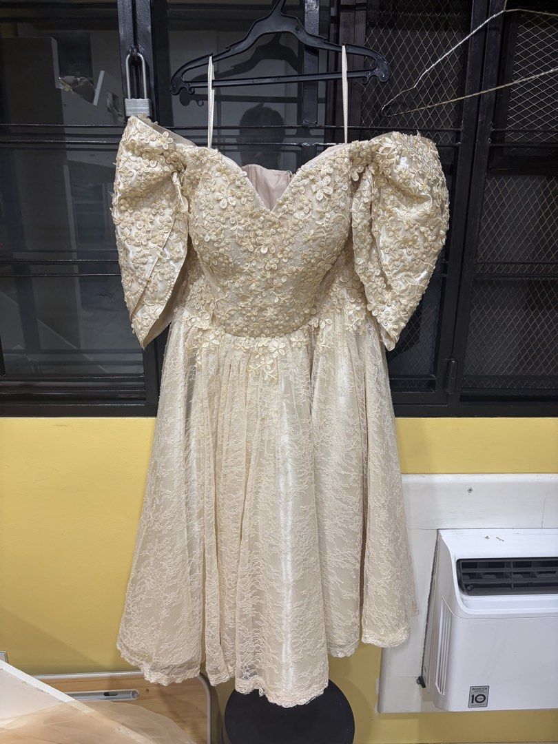 Off-Shoulder Filipiniana Dress (Category: Dresses) located in Marikina City. Submitted by vderxsp (Listing ID 1436438646, Image 1). Description: - Light beige off-shoulder cocktail dress - Intricate floral embellishments - Flattering A-line skirt - Knee-length - Ideal for special occasions.