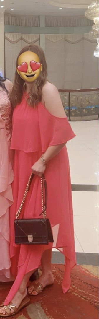 Pink Gown (Category: Dresses) located in Quezon City. Submitted by fly29 (Listing ID 1436448296, Image 1). Description: - pink dress - Off-shoulder design - Asymmetrical hemline - Halter neckline - Layered bodice - Size: M/M but could fit large - Made in Vietnam - Ideal for special occasions and formal events.