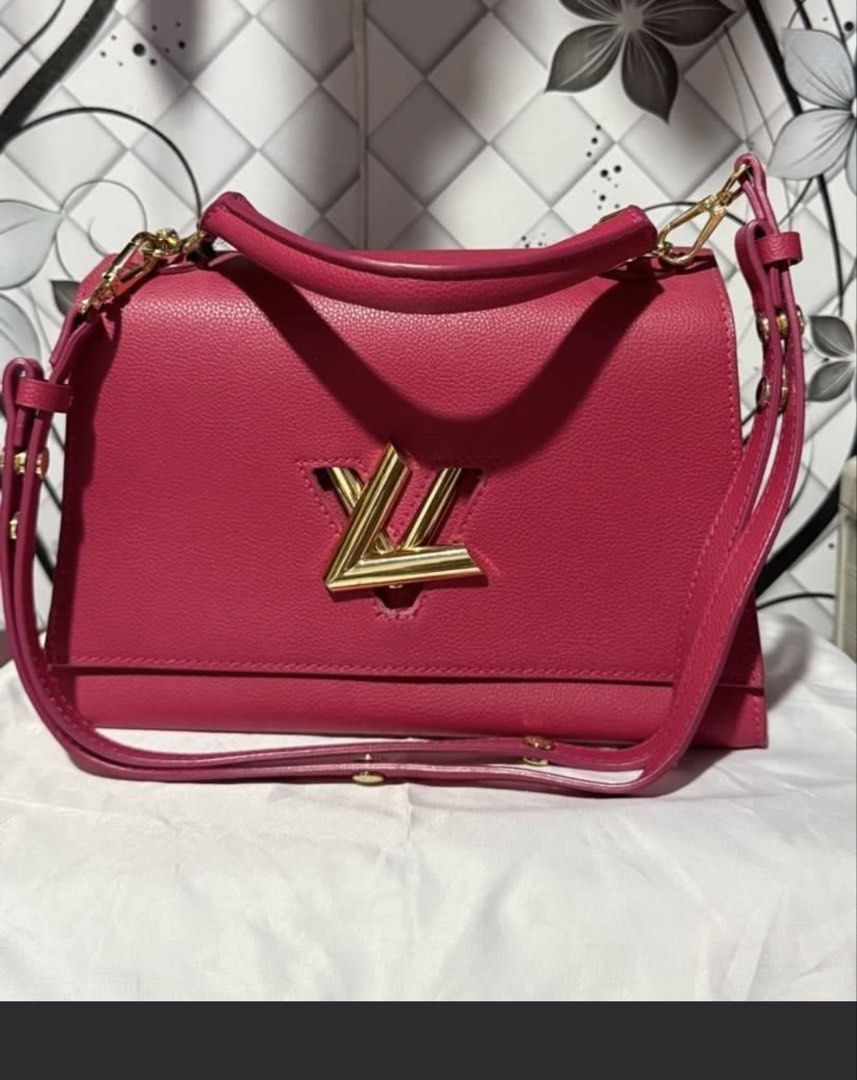 Pink Handbag with Gold Hardware (Category: Luxury Bags & Wallets) located in Manila. Submitted by devorahlop39116 (Listing ID 1436298450, Image 1). Description: - Pink handbag - Gold-tone logo - Top handle - Detachable shoulder strap - Leather material - Flap closure Sign of usage sa handle only.