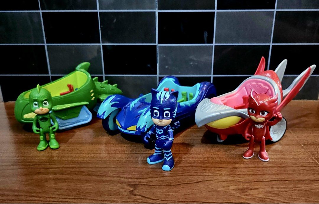 PJ Masks Toy Figures and Vehicles Set (Category: Kids Toys) located in Quezon City. Submitted by tinperen (Listing ID 1436291356, Image 1). Description: - sold as set ₱ 1.2k - Includes Gekko, Catboy, and Owlette figures. - Each figure comes with their matching vehicle. - Perfect for PJ Masks fans! Location: Veterans Village Pasong Tamo QC Pin: Northern Legends Hobby Shop MOP: Gcash, BDO, BPI, COD Shipping: Lalamove, Grab, Flash Epress .