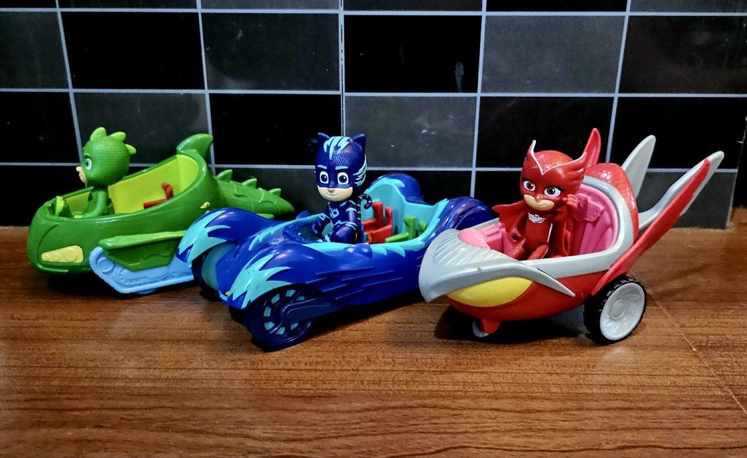 PJ Masks Toy Figures and Vehicles Set (Category: Kids Toys) located in Quezon City. Submitted by tinperen (Listing ID 1436291356, Image 3). Description: - sold as set ₱ 1.2k - Includes Gekko, Catboy, and Owlette figures. - Each figure comes with their matching vehicle. - Perfect for PJ Masks fans! Location: Veterans Village Pasong Tamo QC Pin: Northern Legends Hobby Shop MOP: Gcash, BDO, BPI, COD Shipping: Lalamove, Grab, Flash Epress .