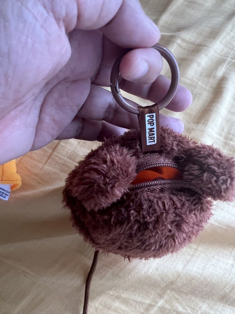 Pop Mart | CRYBABY Crying Again Series-Earphone Case (Category: Earphones) located in Pasig City. Submitted by declutter-tinted (Listing ID 1436410560, Image 3). Description: - Original | Pop Mart |Crybaby - Zipper closure - Very good condition *No rush transaction please .