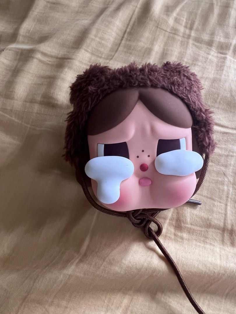 Pop Mart | CRYBABY Crying Again Series-Earphone Case (Category: Earphones) located in Pasig City. Submitted by declutter-tinted (Listing ID 1436410560, Image 2). Description: - Original | Pop Mart |Crybaby - Zipper closure - Very good condition *No rush transaction please .