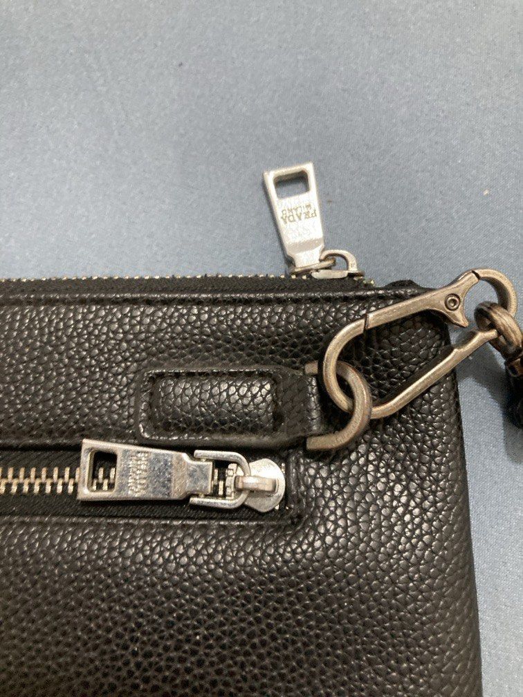 Prada clutch (Category: Luxury Bags & Wallets) located in Paniqui. Submitted by swiftdragon.c69cc8 (Listing ID 1436398515, Image 2). Description: .
