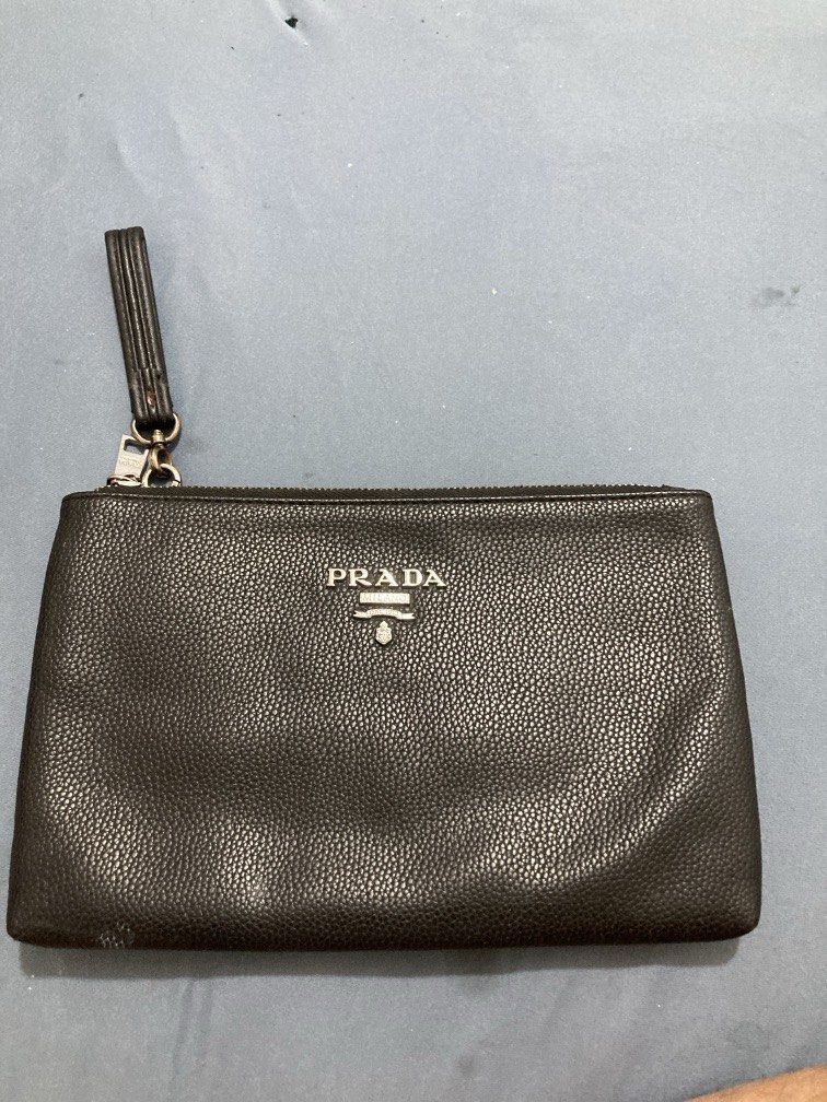 Prada clutch (Category: Luxury Bags & Wallets) located in Paniqui. Submitted by swiftdragon.c69cc8 (Listing ID 1436398515, Image 1). Description: .