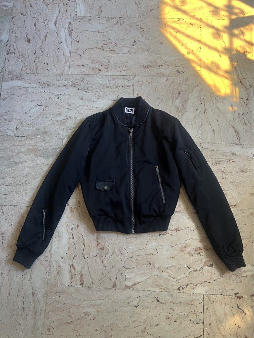 Diesel Black Bomber with Leather Jacket Women (Category: Coats, Jackets and Outerwear) located in San Jacinto. Submitted by rex_finds (Listing ID 1432298063, Image 1). Description: - Ganda ng quality. Premium bomber jacket 👌 - Dimes : 16 x 19.5 inches up to 17 inches - Arm length: 25 inches - Best fit is small to medium - Pm for more pics and info - Black Diesel bomber jacket - Leather detailing on shoulders - 1 issue. Check last pic. - Di halat
