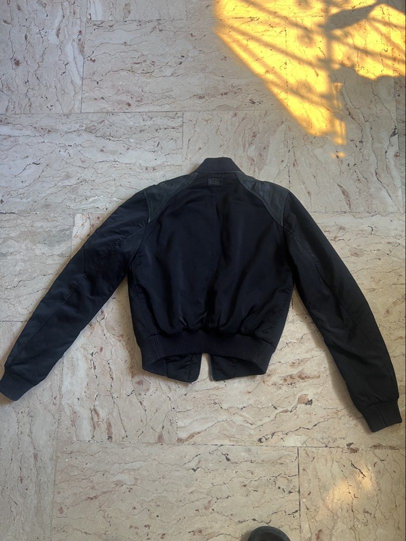 Diesel Black Bomber with Leather Jacket Women (Category: Coats, Jackets and Outerwear) located in San Jacinto. Submitted by rex_finds (Listing ID 1432298063, Image 2). Description: - Ganda ng quality. Premium bomber jacket 👌 - Dimes : 16 x 19.5 inches up to 17 inches - Arm length: 25 inches - Best fit is small to medium - Pm for more pics and info - Black Diesel bomber jacket - Leather detailing on shoulders - 1 issue. Check last pic. - Di halat