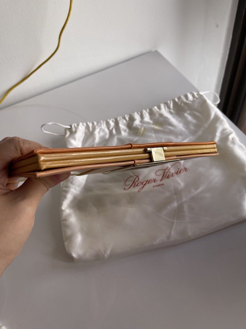 Roger Vivier Evening clutch bag (Category: Luxury Bags & Wallets) located in Taguig. Submitted by supplementary (Listing ID 1370625707, Image 3). Description: Cleaning closet! With dustbag only This is authentic, I don't use FAKE!.