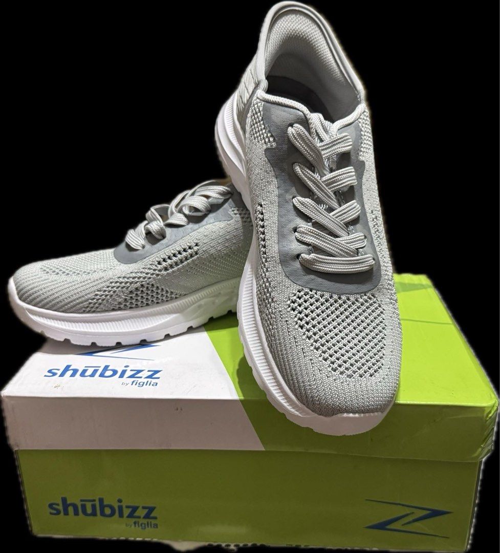 Shubizz by Figlia Gray Sneakers Size 40 (Category: Sneakers) located in Quezon City. Submitted by babybutton2018 (Listing ID 1436409679, Image 1). Description: - Gray Shubizz by Figlia sneakers - Size 40 - Breathable knit upper - White soles - Slide-on style - Textured soles for grip - Includes original box.