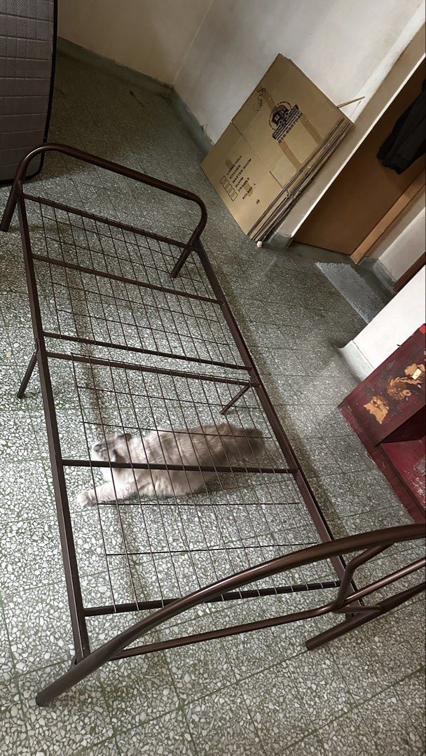 Single Bed Frame (Category: Bed Frames & Mattresses) located in Kuala Lumpur. Submitted by fastwind_c57b84 (Listing ID 1436346017, Image 3). Description: - bought it but never use - Single bed frame with metal frame - steady no noise - Brown color - Includes headboard - Suitable for single-sized mattress - Sturdy and ready for use - Shown assembled and disassembled Mattress is separate.