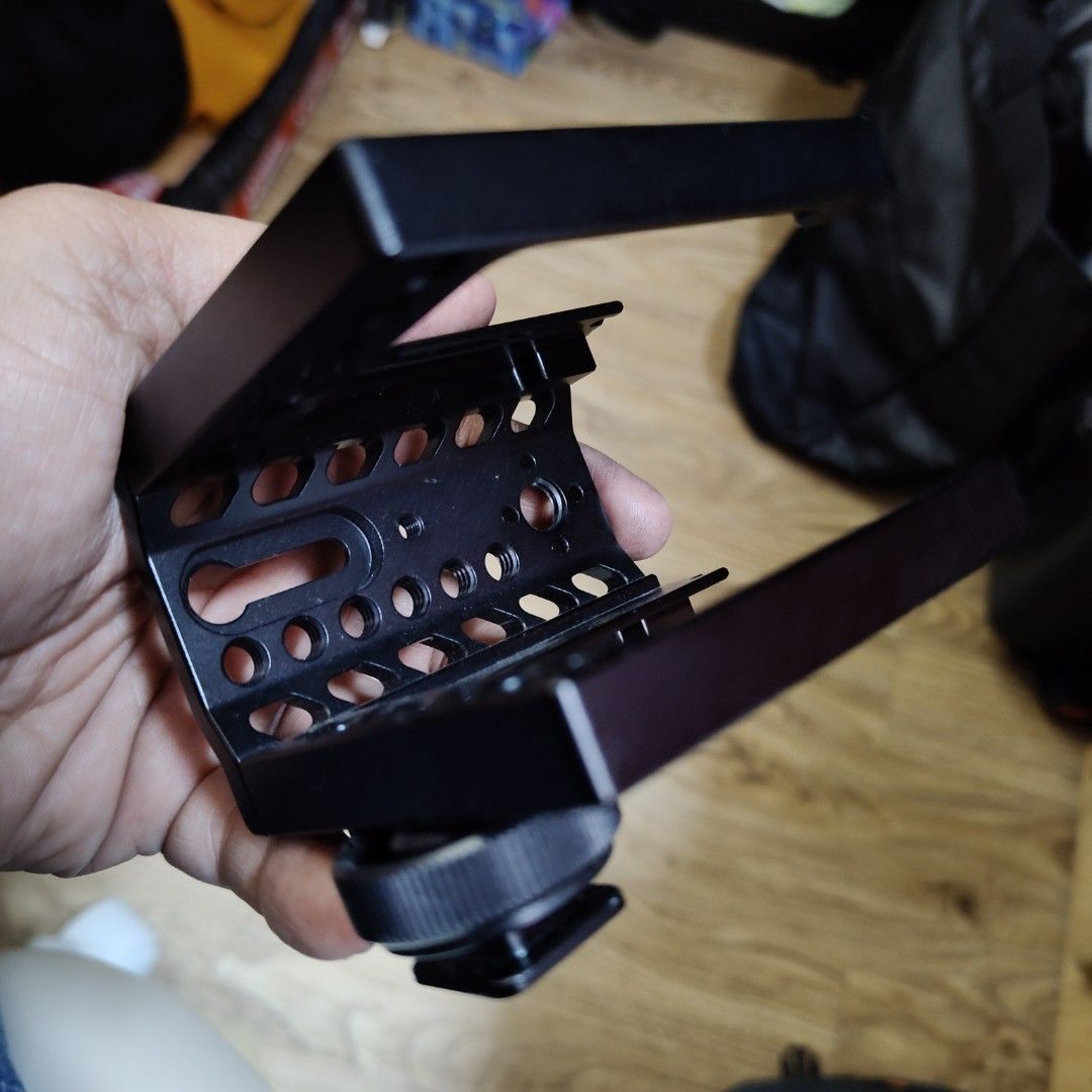 SmallRig Camera Cage (Category: Cameras) located in Manila. Submitted by rossinicalabig (Listing ID 1436345973, Image 3). Description: 1,700 Pesos only. SmallRig BSM 2298 Rodelink cage. It features multiple mounting points for 2 audio receivers and a secure design. It is designed to provide additional protection and mounting options for your camera..