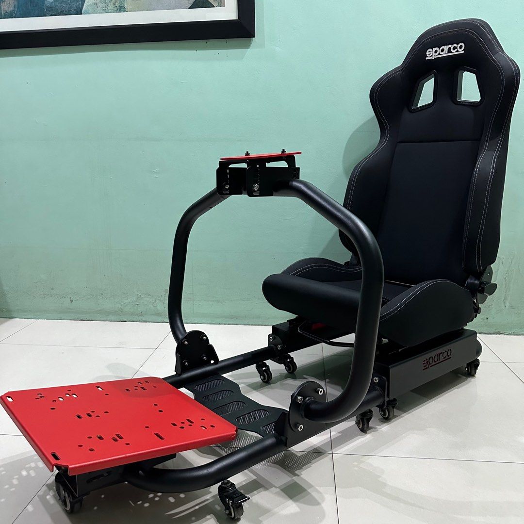 Sparco Evolve Driving Simulator Rig (Category: Controllers) located in Quezon City. Submitted by karllu (Listing ID 1436374254, Image 2). Description: For Sale: Sparco Evolve Driving Simulator Rig -Top-tier Racing Simulator Cockpit Chassis -Orig Black Sparco R100 Racing Seat -Modeled after seats in real racing cars -Compatible with all steering wheels and pedals on the market, including Logitech, Thrustmaster, Moza and Fanatec -Superior High Stre
