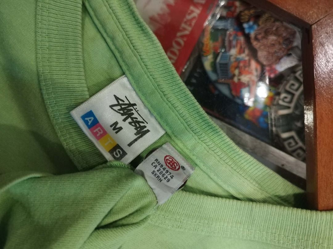 Stussy Arts T-shirt Medium (Category: Tshirts & Polo Shirts ) located in Mandaluyong City. Submitted by earlythrifty (Listing ID 1436451865, Image 1). Description: - Stussy Arts T-shirt (90s vintage rare) - Size: Medium - Color: Light Green - Graphic print on the back - Crew neck - Short sleeves - Authentic Stussy tag.