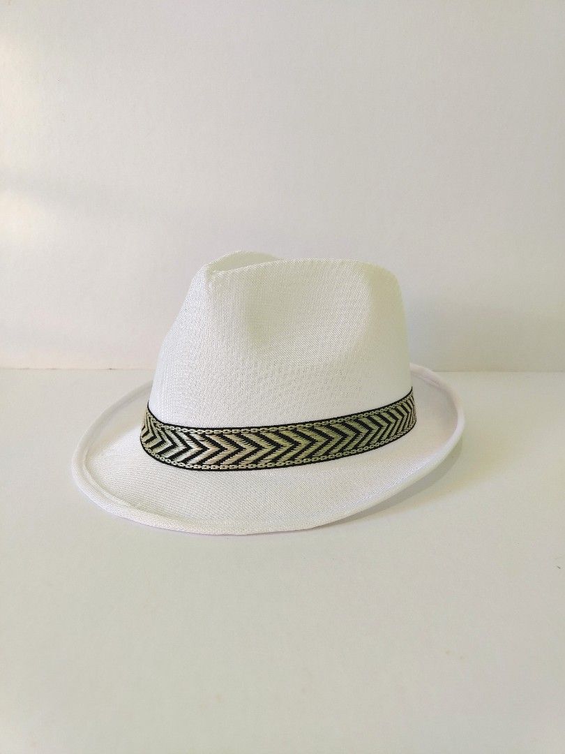 SUMMER Trilby Hat with White Band (Category: Hats & Beanies) located in Bacoor. Submitted by mikeshun (Listing ID 1436389901, Image 1). Description: Elevate your warm-weather wardrobe with this classic white trilby hat. Featuring a sleek, narrow brim and a distinctive patterned band, this hat offers a sharp, modern silhouette that works for both casual outings and more formal summer events. ​WHY IT'S YOUR BEST SUMMER CHOICE - ​Optimal Breathabili