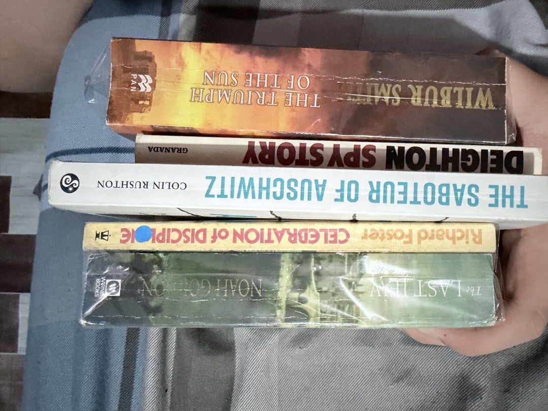 TAKE ALL FOR 49 Assorted Paperback Books (Mixed Genre) (Category: Storybooks) located in Paranaque City. Submitted by napoleon2008 (Listing ID 1436306358, Image 1). Description: - Paperback book collection for sale. - Titles include: - "The Triumph of the Sun" by Wilbur Smith - "Spy Story" by Len Deighton - "The Saboteur of Auschwitz" by Colin Rushton - "Celebration of Discipline" by Richard Foster - "The Last Jew" by Noah Gordon - Some books are