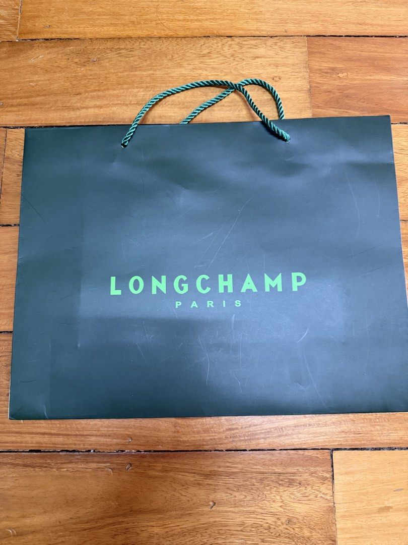 TH , Longchamp , Aape , Charles & Keith Paper Gift Bag (Category: Luxury Bags & Wallets) located in Manila. Submitted by a.c.shop (Listing ID 1436384447, Image 3). Description: TH - 450 Longchamp 2 avail - 450 each Aape ( with yellow stains ) - 150 Charles & Keith ( white color with hole ) - 200 ( dark color ) - 280 .