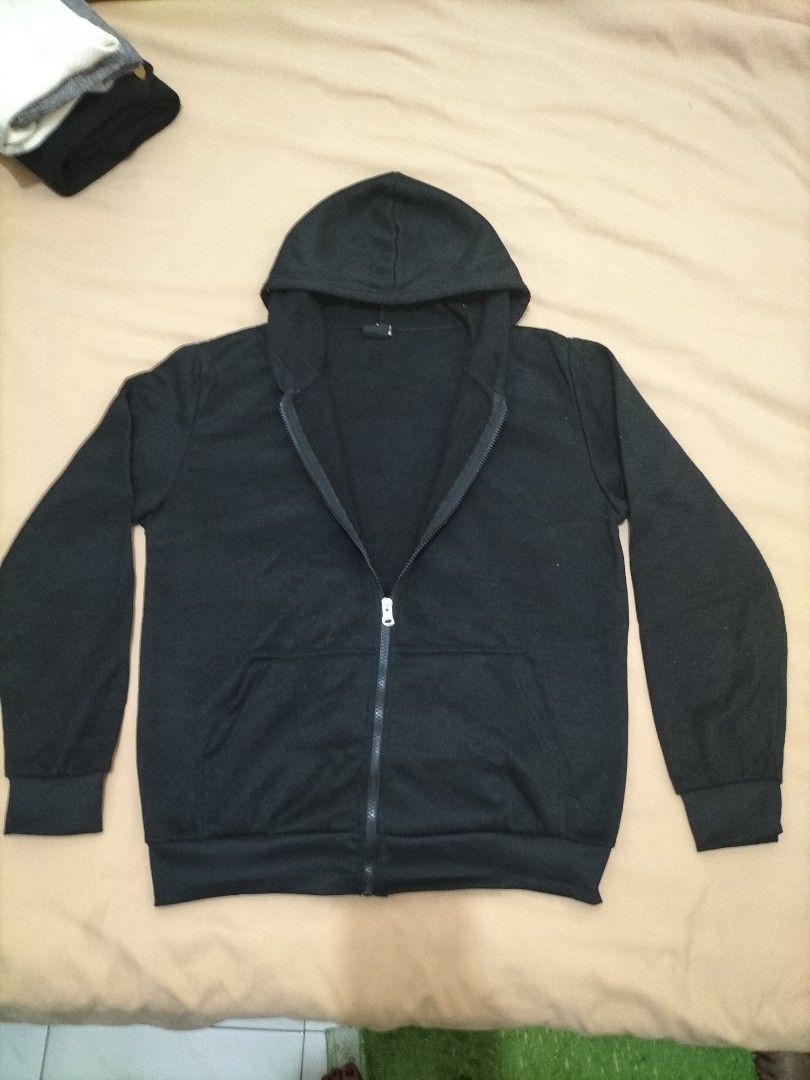 The Common Hoodie - Black - Size L (Category: Hoodies) located in Las Pinas. Submitted by declutter.with.eca (Listing ID 1436311863, Image 2). Description: - The Common black hoodie - Size: L - Features a hood - Made of soft material - Comfortable for everyday wear - Tag is visible.