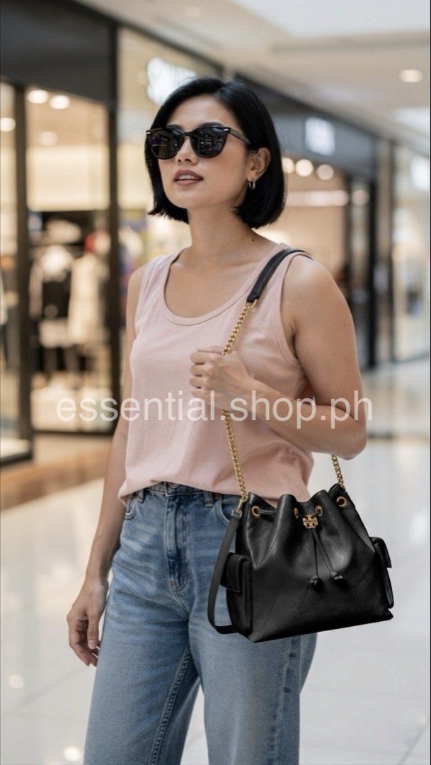 Tory Burch Charlie Quilted Drawstring Shoulder Bag Black (Category: Luxury Bags & Wallets) located in Manila. Submitted by essential.shop.ph (Listing ID 1436405517, Image 2). Description: FOR PRE-ORDER! 1-2 weeks ETA AUTHENTIC with ACTUAL PICTURES POSTED Tory Burch Charlie Quilted Drawstring Shoulder Bag in Black Soft pebbled leather Microfiber lining Interior zip pocket 2 side pockets with magnetic closure Includes dust bag, tag and paper bag. A