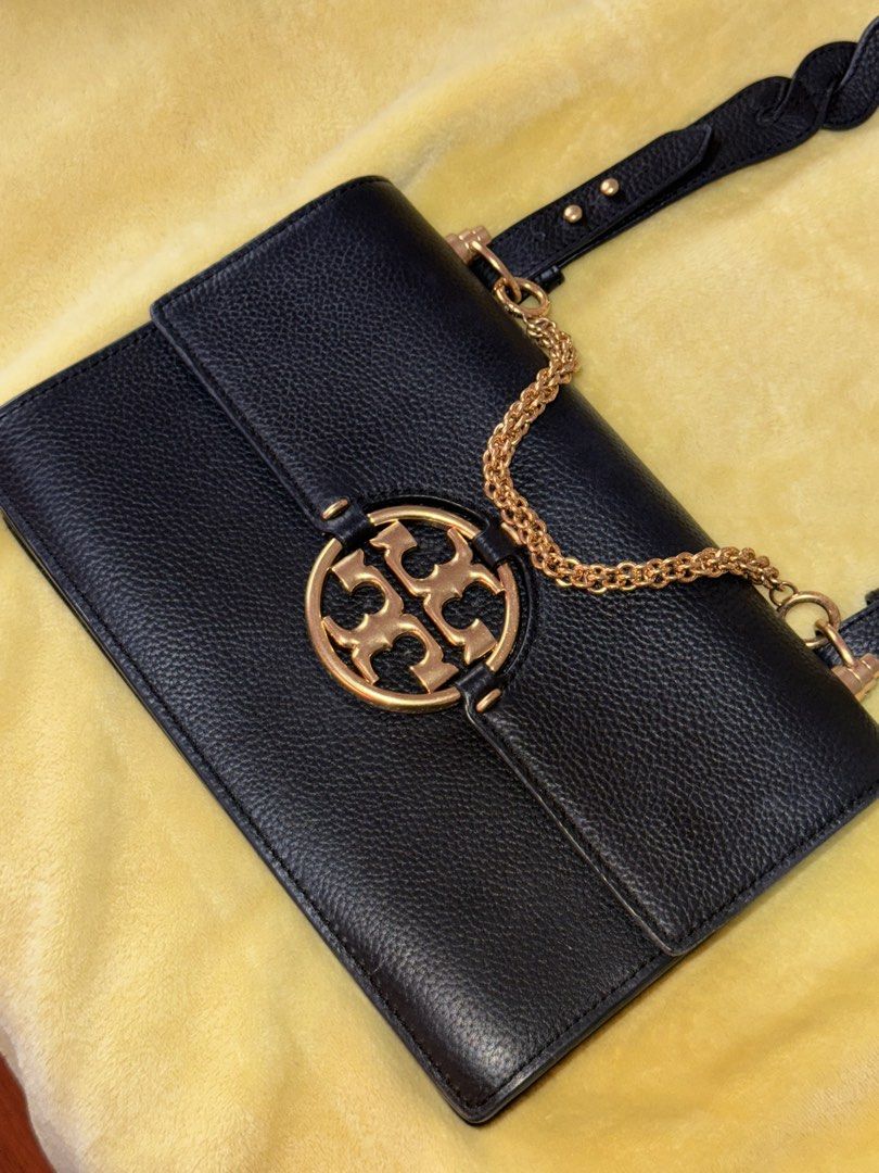 Tory Burch Miller Leather Flap Shoulder Bag (Category: Luxury Bags & Wallets) located in Bacoor. Submitted by budolkweenRose (Listing ID 1436382440, Image 2). Description: Lightly used and well maintained—still in great condition with minimal signs of wear. ✔️ 100% Legit / Original ✔️ With serial number (verifiable via Barcode Spider) ✔️ Premium leather material ✔️ Signature Tory Burch logo ✔️ Gold-tone chain strap 💼 Spacious enough for your dai