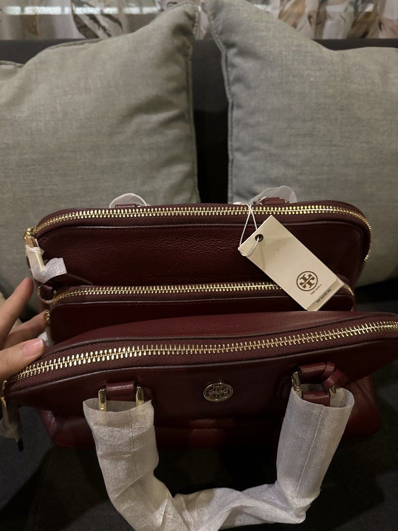 Tory Burch Robinson Embossed Triple Zip Satchel (Category: Shoulder Bags) located in Manila. Submitted by jerramarieee (Listing ID 1436462119, Image 2). Description: - Tory Burch Robinson Embossed Triple Zip Satchel - Color: Deep Berry - Design: Triple zip - Hardware: Gold-tone - Features: Top handle, detachable tag - Style Number: 321469605 • Original Price: $535.00 (Approx. ₱30,800) • Selling Price: ₱15,000.