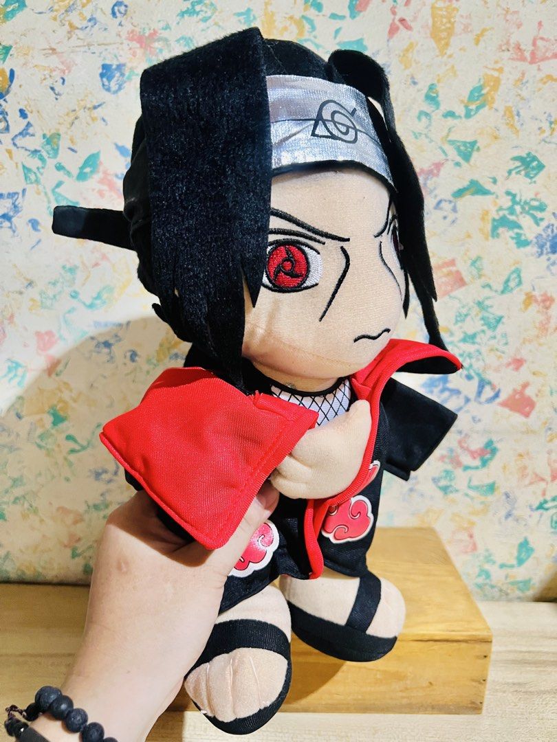 Uchiha Itachi Plush toy (Category: Plushies & Soft Toys) located in Taguig. Submitted by lae.onlineshop (Listing ID 1436465029, Image 2). Description: Uchiha Itachi Plush toy *No label/etiketa/paper tag. May or may not be official. AUTHENTICITY NOT GUARANTEED. *THE COLOR MAY SLIGHTLY DIFFER FROM ACTUAL DUE TO LIGHTING AND/OR SCREEN RESOLUTION. Size: approx 33cm Issue: needs minimal cleaning, nawala yung dikit sa may hair(see photos), AS IS ‼️1 DA