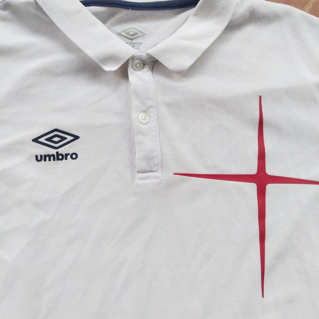 Umbro England White Polo Jersey (Category: Tshirts & Polo Shirts ) located in Tarlac. Submitted by ukay.kay.jay (Listing ID 1436361956, Image 3). Description: Brand: Umbro Condition: 9/10 Color Rate: 9/10 Issue: None Extra Info: Prints in pristine condition Dimes: 28.5(L)x 23(W) in Price: 200+sf (free for any purchase above 600 pesos) Shipping: J&T (Preferred), LBC Payment: Gcash (Preferred), Landbank, COD if LBC ‼️ITEMS ARE PRE-WASHED AND ALL IS