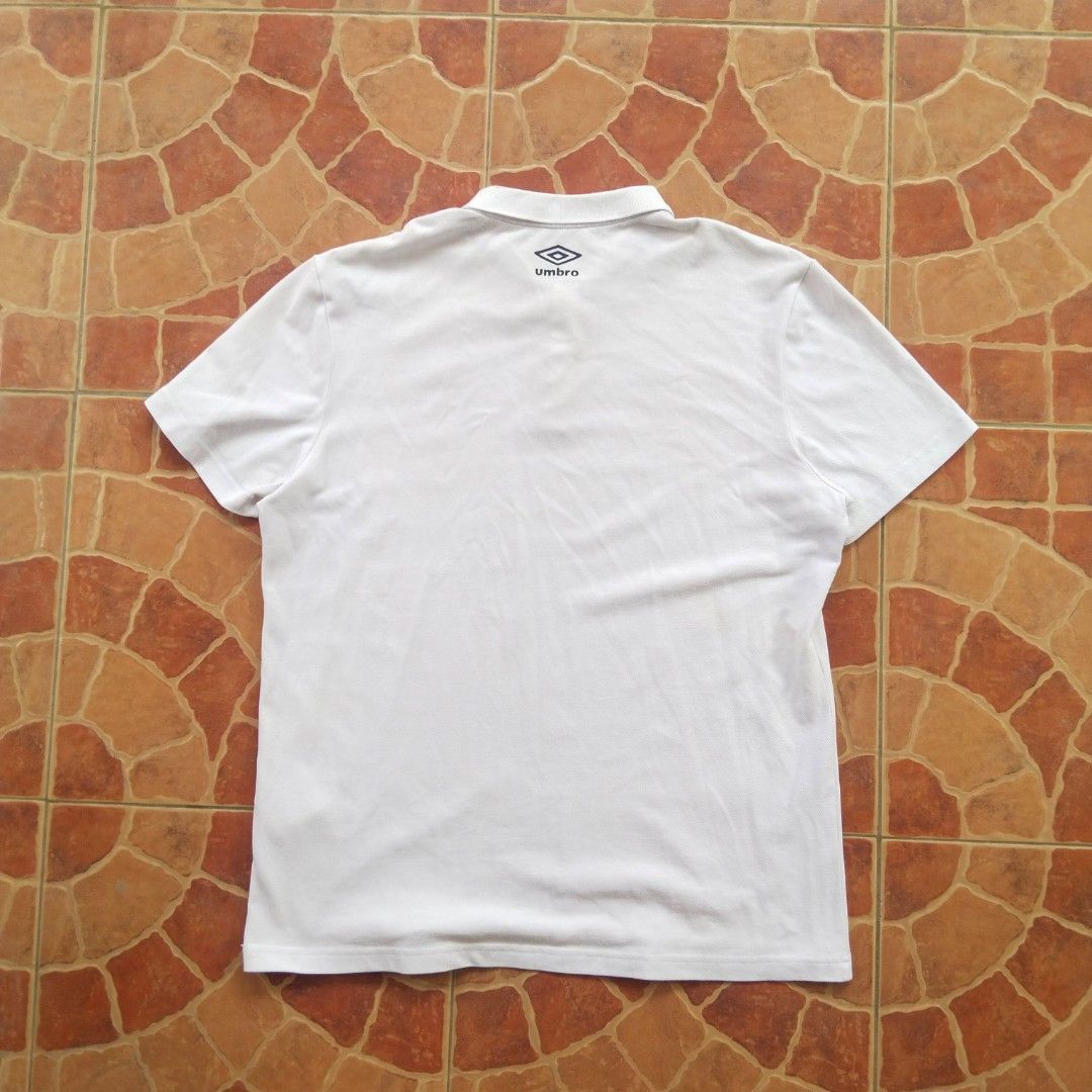 Umbro England White Polo Jersey (Category: Tshirts & Polo Shirts ) located in Tarlac. Submitted by ukay.kay.jay (Listing ID 1436361956, Image 2). Description: Brand: Umbro Condition: 9/10 Color Rate: 9/10 Issue: None Extra Info: Prints in pristine condition Dimes: 28.5(L)x 23(W) in Price: 200+sf (free for any purchase above 600 pesos) Shipping: J&T (Preferred), LBC Payment: Gcash (Preferred), Landbank, COD if LBC ‼️ITEMS ARE PRE-WASHED AND ALL IS