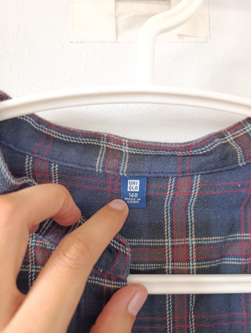 Uniqlo Plaid Dress (Category: Dresses) located in Manila. Submitted by stuffsbybrix (Listing ID 1436366678, Image 2). Description: - Uniqlo plaid dress - Size: 160/ small sa audit - Color: Blue, red, and brown plaid - Features: Mandarin collar, button-down front - Sleeves: Long - Material: Soft woven fabric color may vary due to lighting rfs: decluttering .