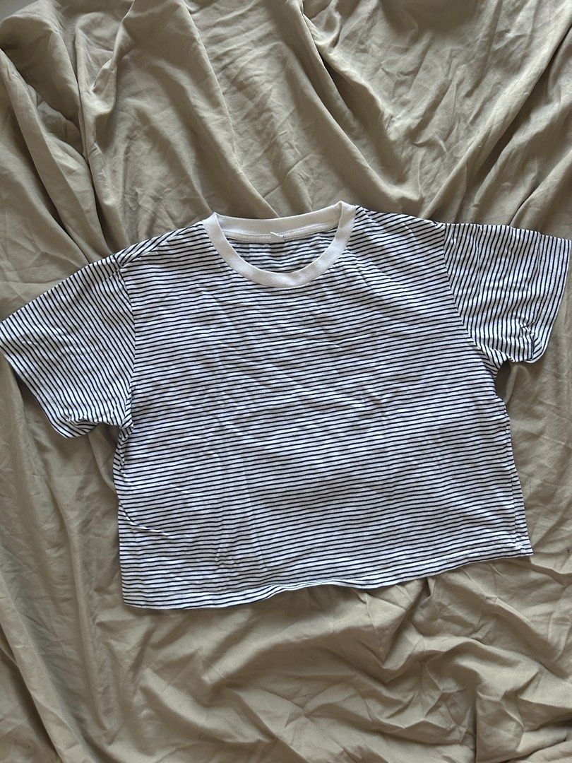 Uniqlo Striped Crop Top - Medium (Category: Shirts) located in Binan City. Submitted by missrandomthings (Listing ID 1436364959, Image 1). Description: - Uniqlo crop top - Classic striped design - White collar - Size: Medium - Made in China - Short sleeves - Comfortable fit - Perfect for everyday wear.