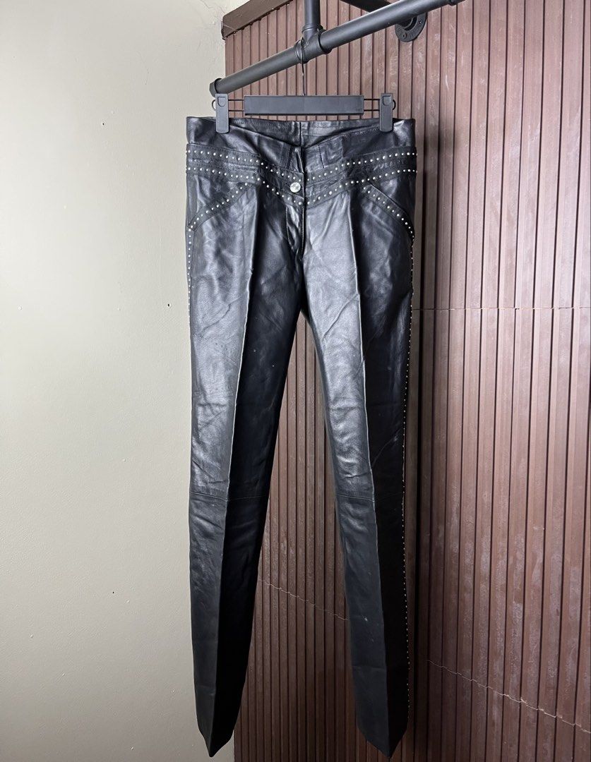 Versace Couture Studded Flared Leather Pants (Category: Jeans) located in Cabanatuan. Submitted by cabsygoods (Listing ID 1436398325, Image 1). Description: Versace Couture Studded Flared Leather Pants Waistline 30 Length 40 Very good condition No issue Color rate 9/10 Dm to purchase! 📩.
