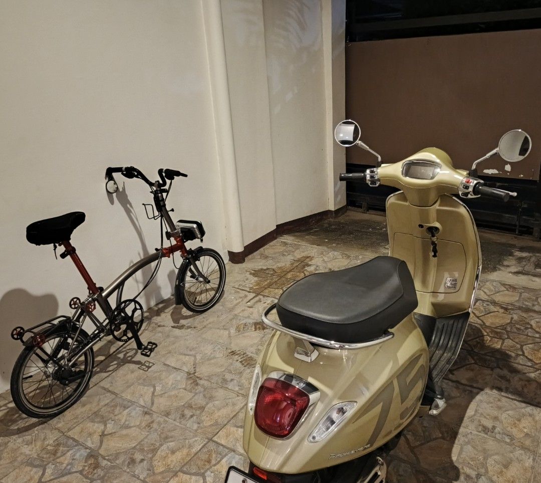 Vespa Primavera Scooter (Category: Motorbikes for Sale) located in Cebu City. Submitted by j0pay_mustakana (Listing ID 1436374712, Image 2). Description: - Gold Vespa Primavera scooter with chrome accents and mirrors. -75th anniversary edition complete memorabilia leather bag original floormat marus dipstick.