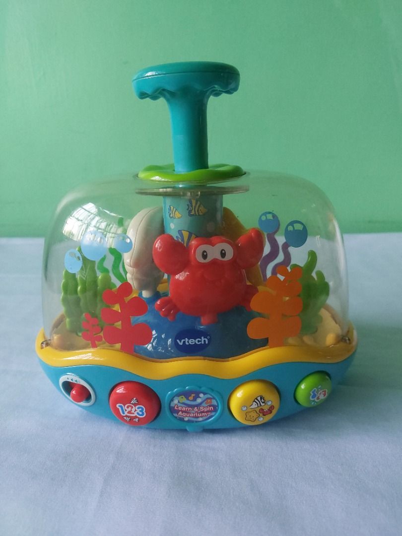 VTech Learn & Spin Aquarium Toy (Category: Educational & Learning Toys) located in Paranaque City. Submitted by ca.firstonlinebiz (Listing ID 1436434177, Image 1). Description: Preloved VTech Learn & Spin Aquarium -toy features a colorful underwater scene with a crab and other sea creatures. -working lights and sounds -issue on plunger needs to pull also -needs 2xAA batteries Loc. Greenheights Parañaque Open for shipping lalamove or SPX Gcash, Ma