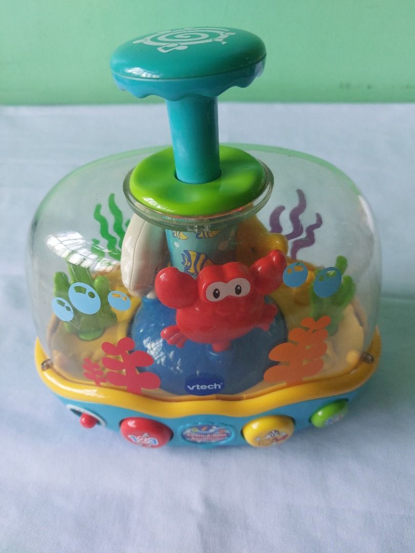 VTech Learn & Spin Aquarium Toy (Category: Educational & Learning Toys) located in Paranaque City. Submitted by ca.firstonlinebiz (Listing ID 1436434177, Image 2). Description: Preloved VTech Learn & Spin Aquarium -toy features a colorful underwater scene with a crab and other sea creatures. -working lights and sounds -issue on plunger needs to pull also -needs 2xAA batteries Loc. Greenheights Parañaque Open for shipping lalamove or SPX Gcash, Ma