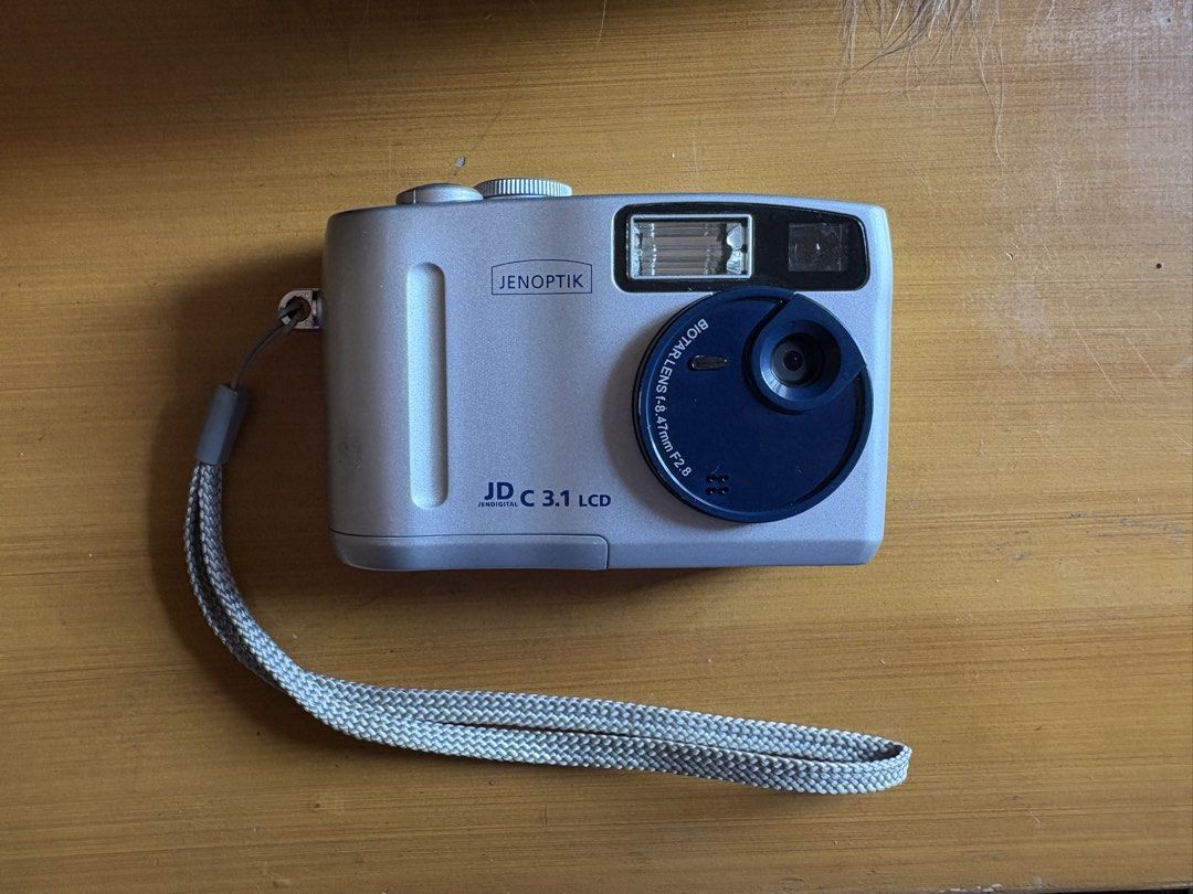 [WORKING] Jenoptik 3 MP Digital Camera / DigiCam (2003) (Category: Cameras) located in Valenzuela. Submitted by neufchatel (Listing ID 1436361722, Image 1). Description: Vintage Jenoptik JD C 3.1 LCD (2003) Fully Functioning Negotiable for sure buyers 3.14 megapixel 16mb internal memory Uses 4 AAA batteries Seamless connection to computer Inclusions: - Unit - Pouch - AAA Batteries RFS: - decluttering MOP: GCash/BPI MOD: Grab/Lalamove.