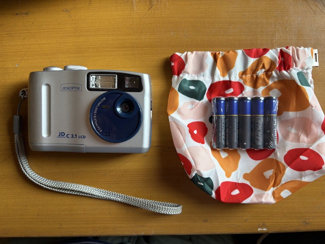 [WORKING] Jenoptik 3 MP Digital Camera / DigiCam (2003) (Category: Cameras) located in Valenzuela. Submitted by neufchatel (Listing ID 1436361722, Image 3). Description: Vintage Jenoptik JD C 3.1 LCD (2003) Fully Functioning Negotiable for sure buyers 3.14 megapixel 16mb internal memory Uses 4 AAA batteries Seamless connection to computer Inclusions: - Unit - Pouch - AAA Batteries RFS: - decluttering MOP: GCash/BPI MOD: Grab/Lalamove.
