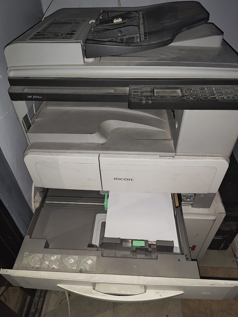 Xerox machine (Category: Other Home Appliances) located in Quezon City. Submitted by jhayjaz08 (Listing ID 1436349275, Image 2). Description: Rush!! Ricoh Copying Xerox machine Model MP2O14ad Very Good condition Heavy duty Good for xerox/printing a business Minsan lang nagamit nabili ng 60k 45k n lng benta.