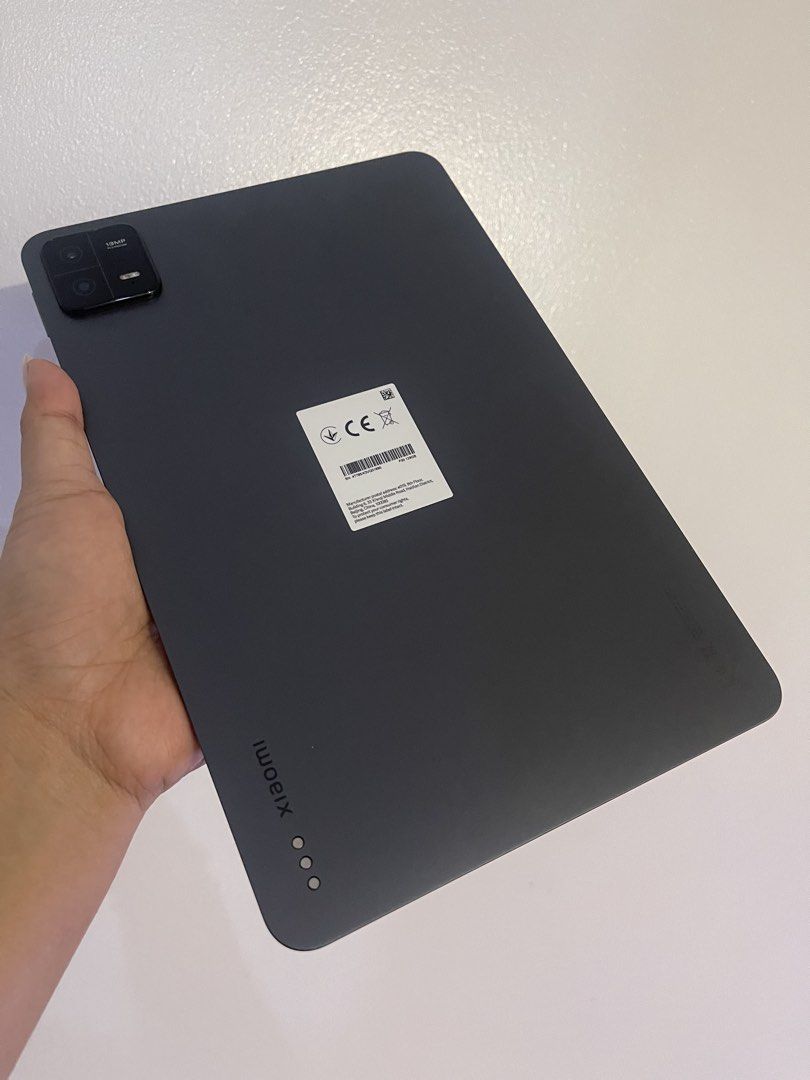 Xiaomi Pad 6 (Category: Android) located in Quezon City. Submitted by stlntndr (Listing ID 1436391135, Image 3). Description: - Xiaomi Pad 6 tablet - Dark gray back - Xiaomi logo - Android OS - Features a camera No issues. No dents/scratches. With charger & casing with keyboard. RS: hindi na ginagamit and need funds.