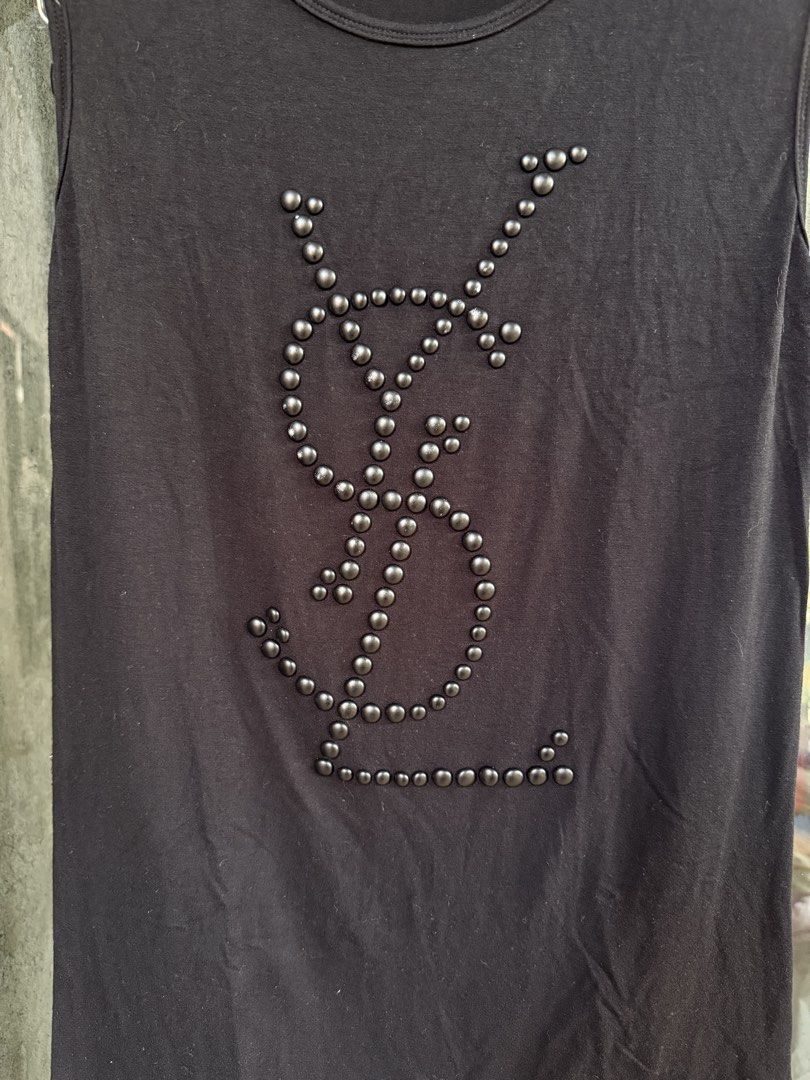Yves Saint Laurent Tank Top (Category: Sleeveless) located in Manolo Fortich. Submitted by thriftacktoe34 (Listing ID 1436423473, Image 3). Description: Excellent condition Color may vary due to lighting Color rate 9.5/10 Size Dimes W16 x L24 inches Issue: may scratch yung ibang beads FREE shipping fee.