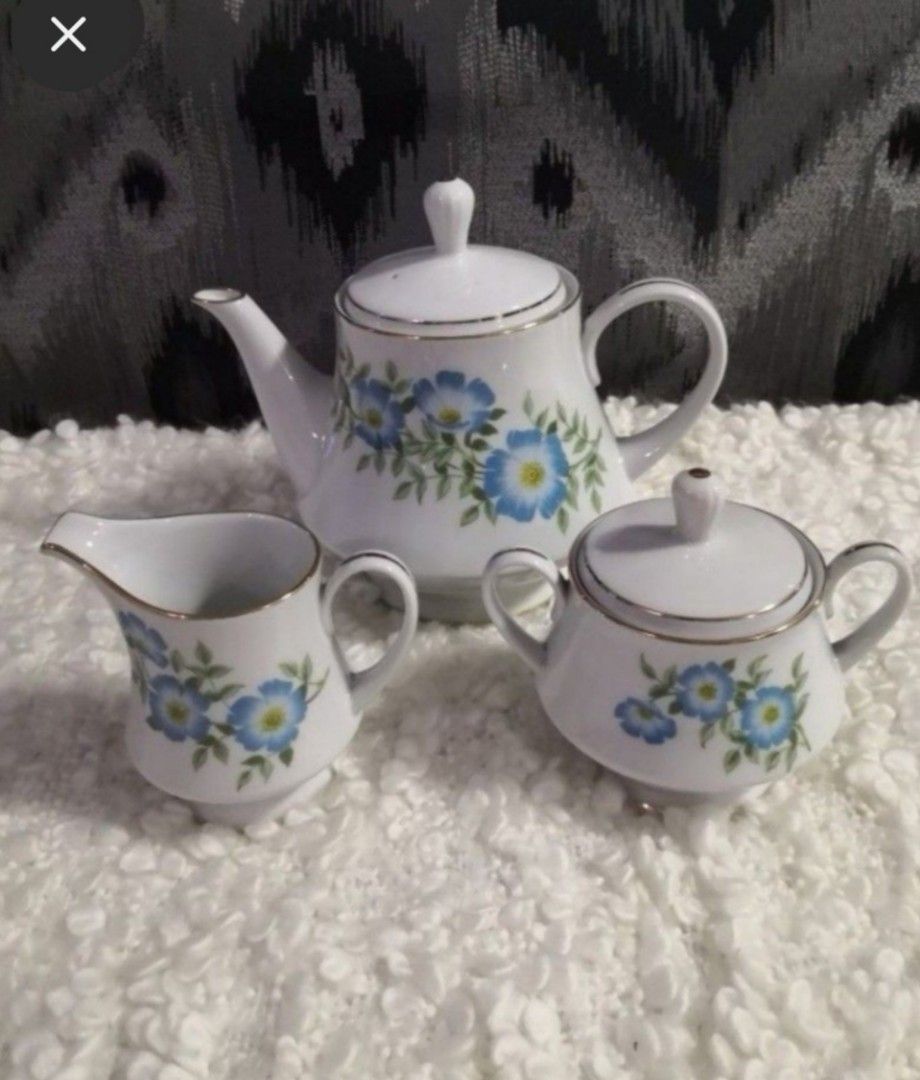 1980's Vintage Floral Dinnerware Set (Category: Dinnerware & Cutlery) located in Mandaluyong City. Submitted by ilovemyshop (Listing ID 1436498735, Image 2). Description: 💟 1980's Vintage dinnerware set 💟 Delicate blue floral design with gold trim border. ❤️ Includes: 6 pcs Dinner Plates 8.5 inches 6 pcs Dessert Plates 5.5 inches 1 pc Soup Bowl with Lid 10 x 3.5 inches 1 pc Teapot with Lid 9 x 7.5 inches 1 pc Sugar Bowl with Lid 6 x 5 inches 1 