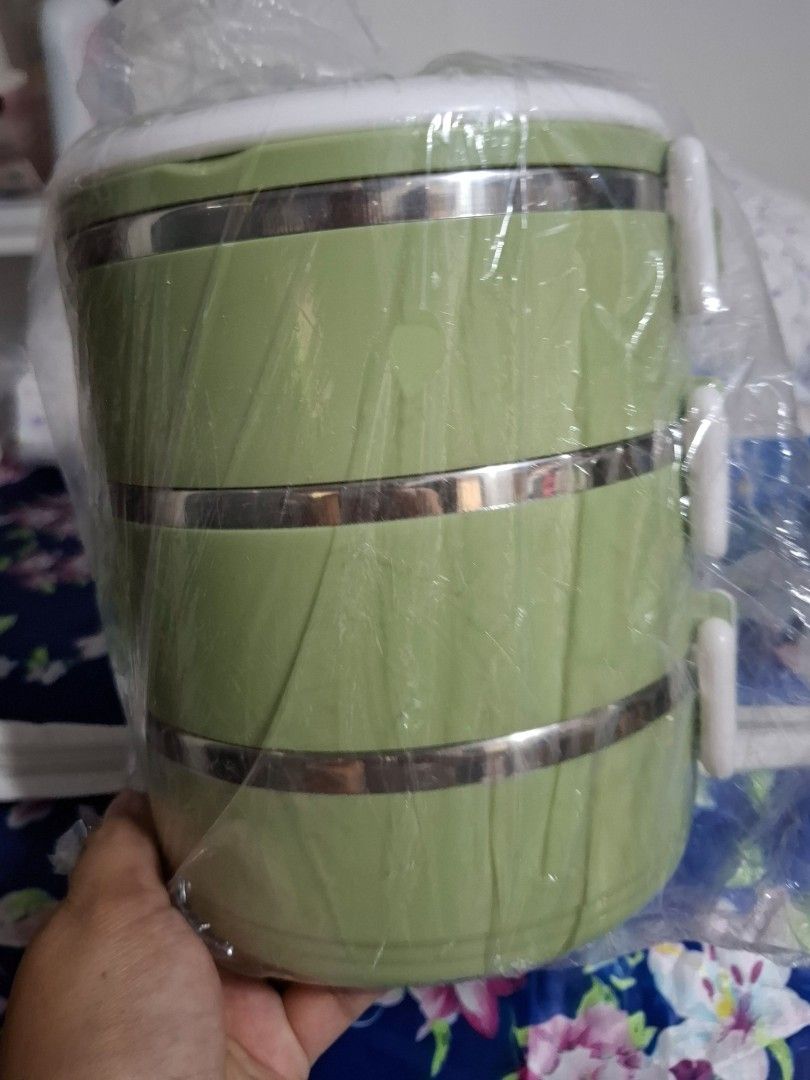 3-Tier Insulated Lunch Box with Handle (Category: Food Organization & Storage) located in Quezon City. Submitted by ana-chan (Listing ID 1436640703, Image 3). Description: - Three-tier design for food separation - Insulated lunch box - Green with silver accents - Includes a handle for easy carrying - Secure clips to keep food safe - Brand new, still in original packaging.