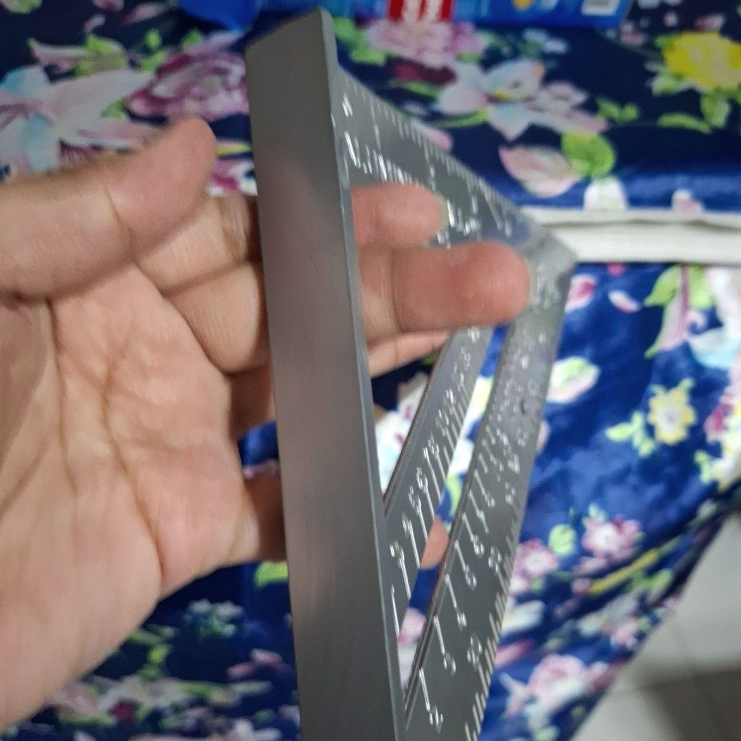 7" Aluminum Alloy Triangle Ruler (Category: Stationery & School Supplies) located in Quezon City. Submitted by an.marie (Listing ID 1436583804, Image 3). Description: - 7-inch Aluminum Alloy Triangle Ruler - Dual measurements: inches and millimeters - Marked with degree angles for precise cuts - Made in China - Dimensions: 18.5cm x 18.5cm x 26cm.