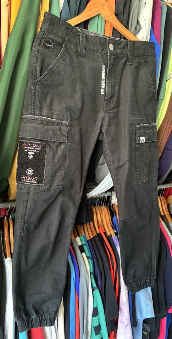 Aape cargo pants (Category: Joggers) located in Manila. Submitted by egayfinds420 (Listing ID 1436499986, Image 2). Description: NEW ARRIVAL 😇🙌 AAPE CARGO PANTS EXCELLENT CONDITION 9.5/10 color rate black na black 😎 Medium 30-34 x 38 1685 + Shipping fee 📍Store location agra gas station amungan iba zambales.