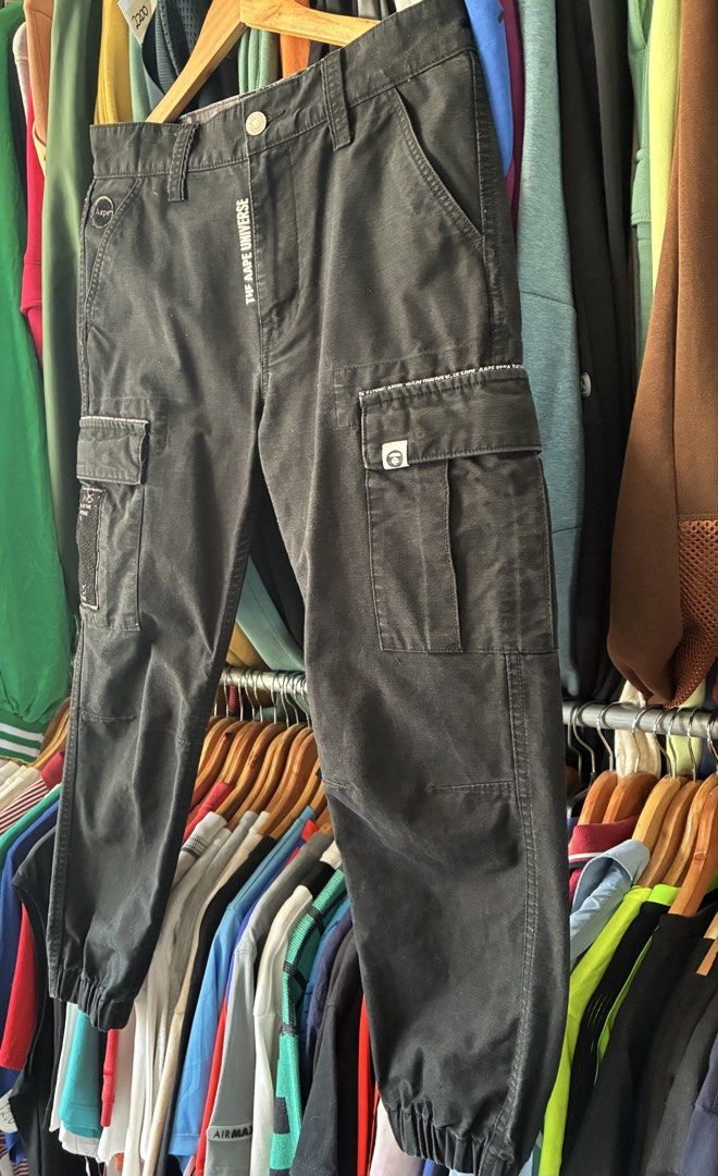 Aape cargo pants (Category: Joggers) located in Manila. Submitted by egayfinds420 (Listing ID 1436499986, Image 3). Description: NEW ARRIVAL 😇🙌 AAPE CARGO PANTS EXCELLENT CONDITION 9.5/10 color rate black na black 😎 Medium 30-34 x 38 1685 + Shipping fee 📍Store location agra gas station amungan iba zambales.