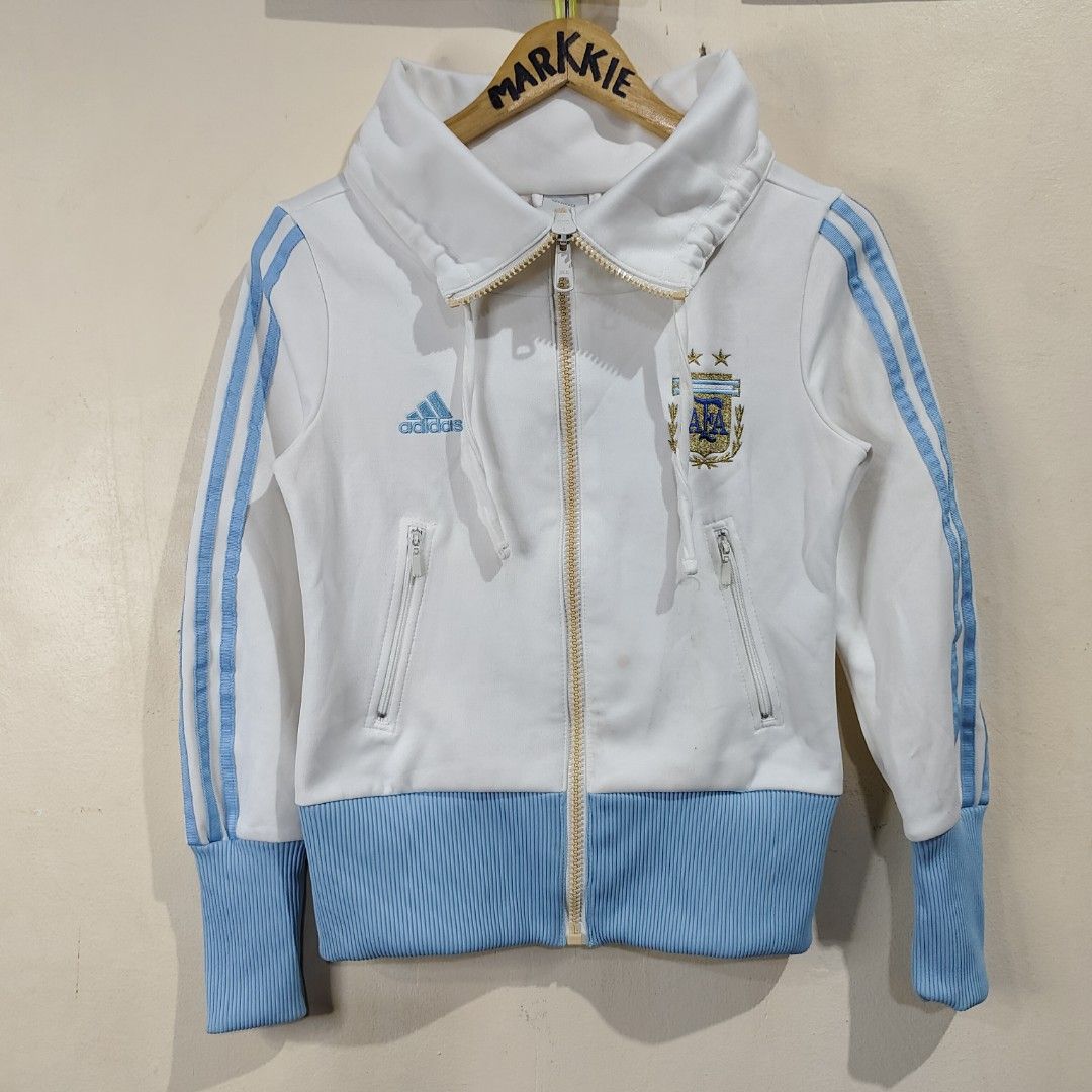 ADIDAS ARGENTINA TRACK JACKET (Category: Coats, Jackets and Outerwear) located in Bulacan. Submitted by markkiethrift2023 (Listing ID 1436588863, Image 1). Description: ADIDAS ARGENTINA TRACK JACKET EXCELLENT CONDITION DIMES: 17 x 27.5 NEED WASH.