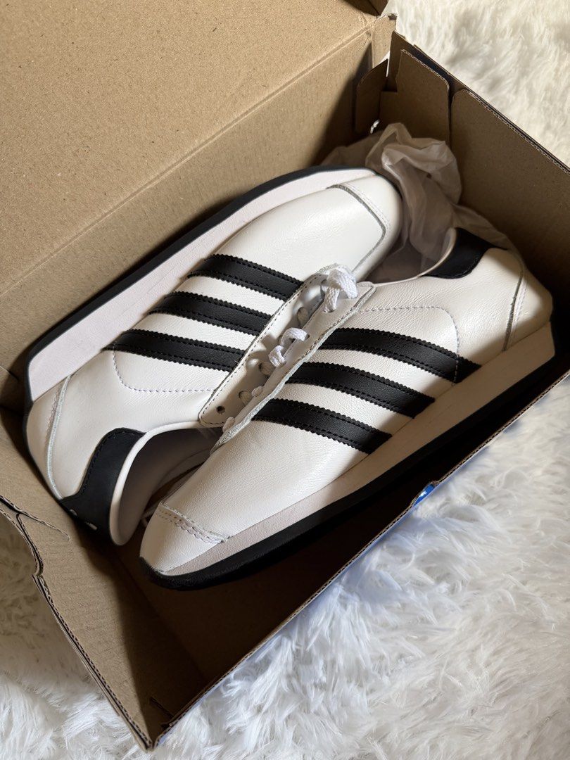 Adidas Country II Sneakers (Category: Sneakers) located in Pasig City. Submitted by declutterwithe (Listing ID 1436541289, Image 3). Description: - Adidas Country II sneakers - White with black stripes - Size: US 4.5 men’s | US 6 women’s - Includes original box .