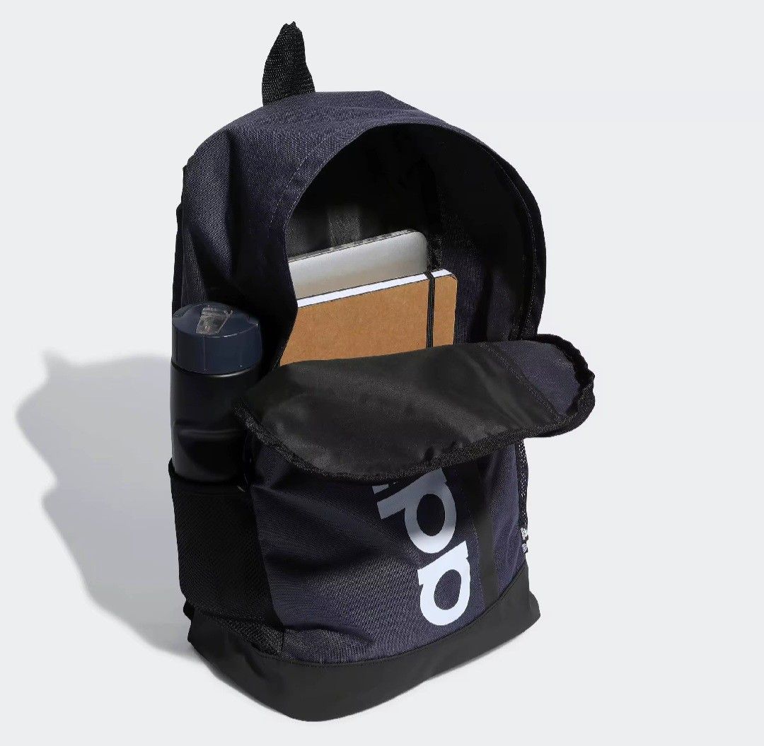 Adidas Lifestyle Essential Linear Backpack - Navy Blue (Category: Backpacks) located in Manila. Submitted by roshisneakerhouse (Listing ID 1436621600, Image 3). Description: - Adidas Lifestyle Essential Linear Backpack - Color: Navy Blue - Features: - Main compartment - Side mesh pocket - Adjustable straps - Adidas logo - Dimensions: 22.5L x 14cm x 26.5cm x 46cm - Perfect for everyday use Brandnew with tag/101% Original Courier:Lalamove/Grab Expr