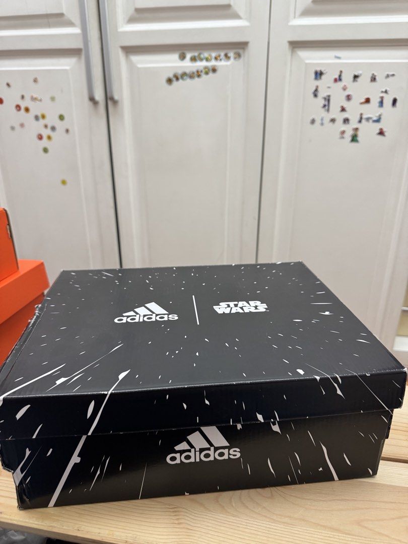 Adidas Ultraboost 19 Star Wars (Category: Sneakers) located in Manila. Submitted by choppee (Listing ID 1436488817, Image 2). Description: - Adidas Ultraboost 19 Star Wars edition - Grey upper with burgundy and blue accents - Features "Jump to Lightspeed" and "Never Tell Me The Odds" heel prints - Dark grey soles - Comes with original box featuring Adidas and Star Wars logos.