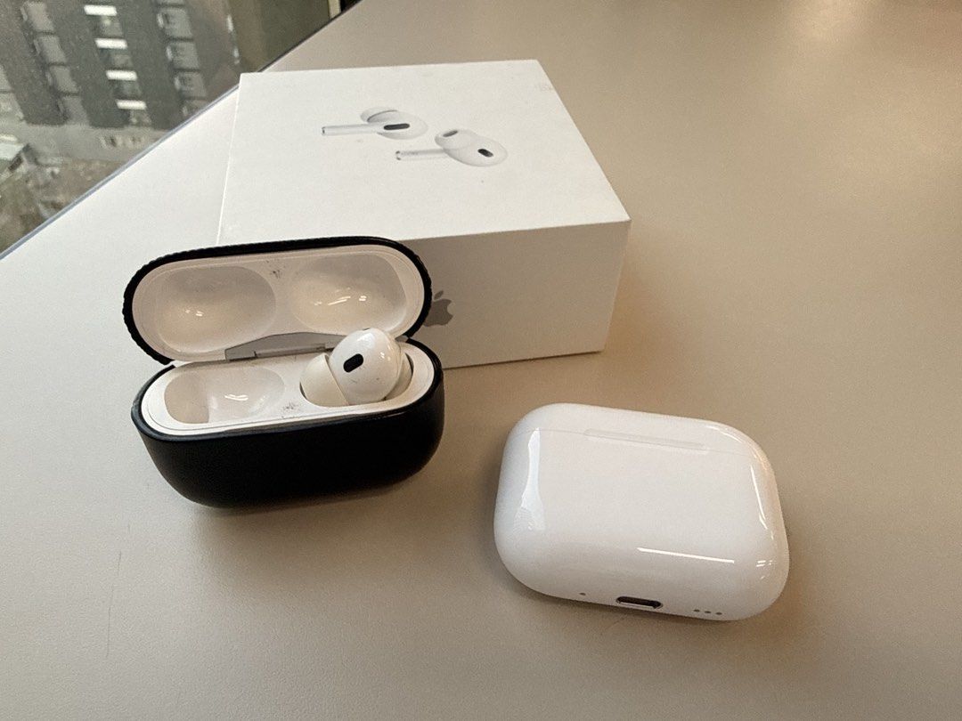 Apple AirPods Pro 2nd Generation (Category: Earphones) located in Caloocan City. Submitted by kielmarxi38357 (Listing ID 1436559311, Image 1). Description: Apple AirPods Pro 2nd Generation. Includes the charging case, extra ear tips, and the original box. The charging case has a black protective cover. The earphones are white. The box shows the AirPods Pro design. The accessories appear to be complete. Missing Left Bud.