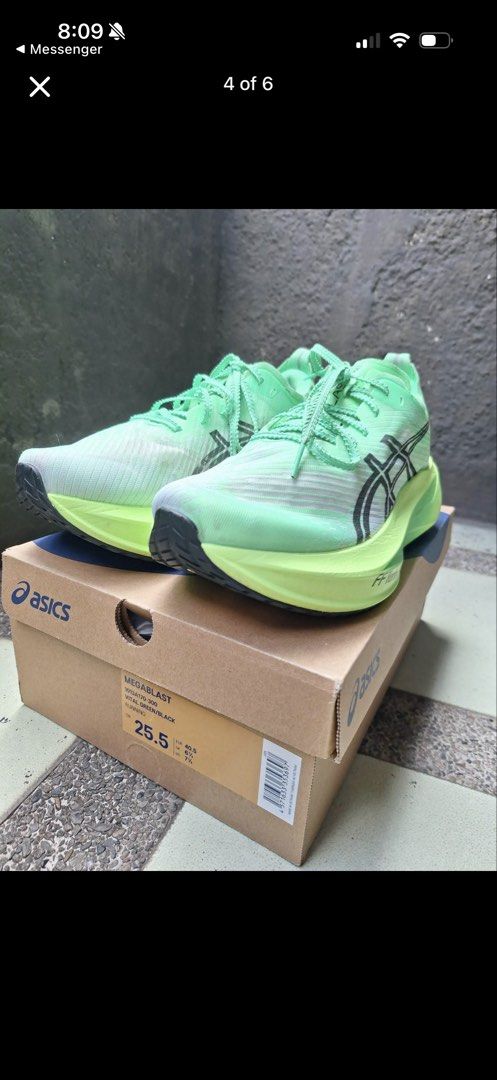 Asics Metaspeed Sky Vital Green/Black (Category: Sneakers) located in General Trias. Submitted by ako_toh (Listing ID 1436471076, Image 2). Description: - Asics Metaspeed Sky running shoes - Color: Vital Green/Black - Size: 25.5 - Includes original box - Signs of wear on soles - Features the Asics logo.