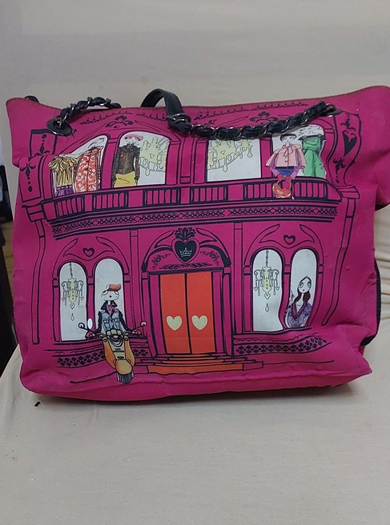 Authentic Love Moschino Pink Tote Bag FREE if you buy any of my items (Category: Tote Bags) located in Quezon City. Submitted by gachrie (Listing ID 1436592696, Image 1). Description: - Authentic Love Moschino tote bag - Eye-catching pink exterior with unique graphic but with signs of uae and bubbles. some very tiny white spots of paint on one side and one handle because it was not properly stored during our house renovation - Chain and leather h